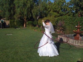 Hula hoop in a wedding dress Of course.jpg